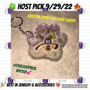 Custom epoxy Red eyed GOOFY keychain paw with 🍀 and my favorite leaf 🍁